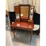 An Edwardian mahogany triple mirrored dressing table with line inlay to drawers, 148cm x 90.5cm x