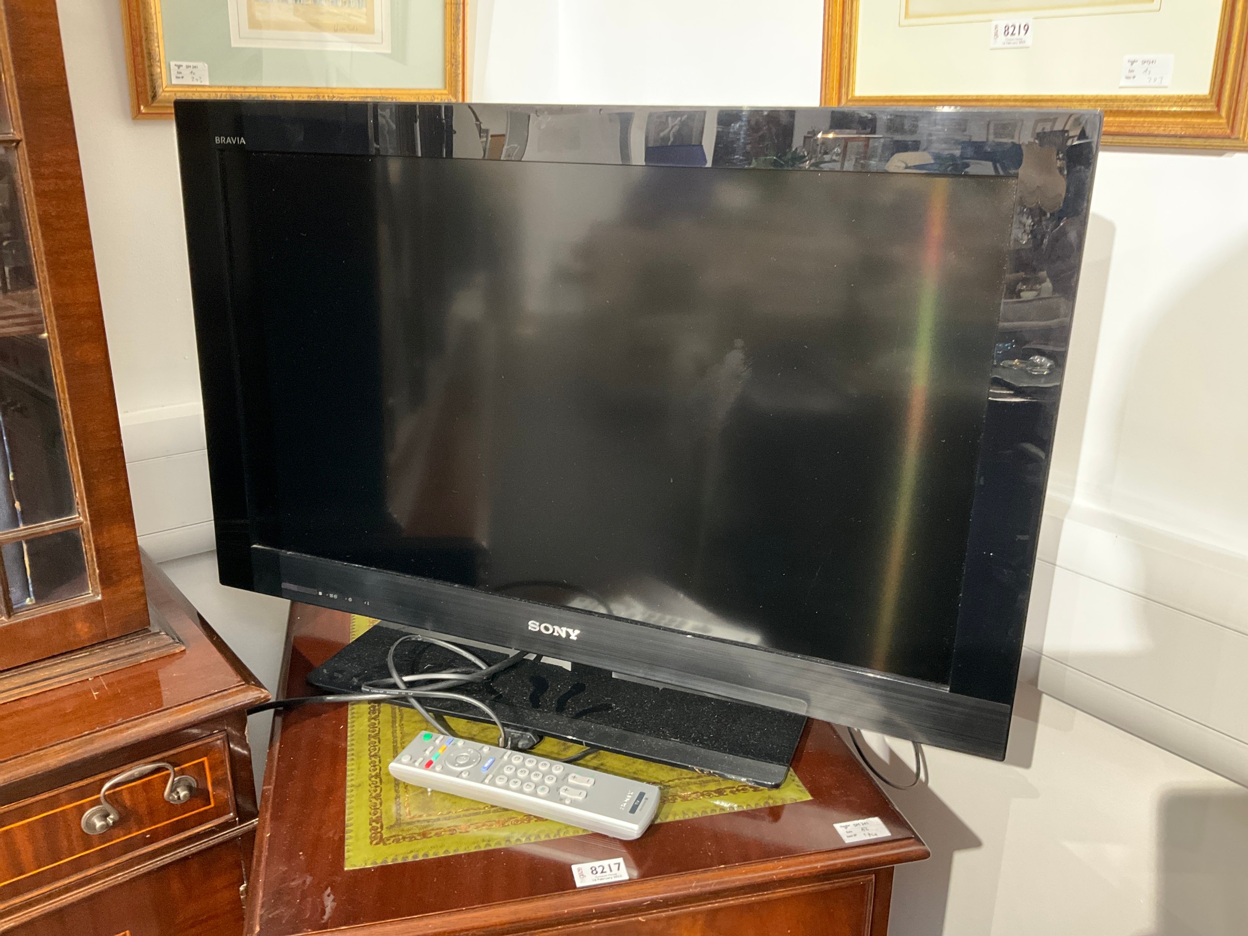 A Sony Bravia flatscreen TV Model No. KDL-32CX520, 31.5" screen