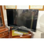 A Sony Bravia flatscreen TV Model No. KDL-32CX520, 31.5" screen