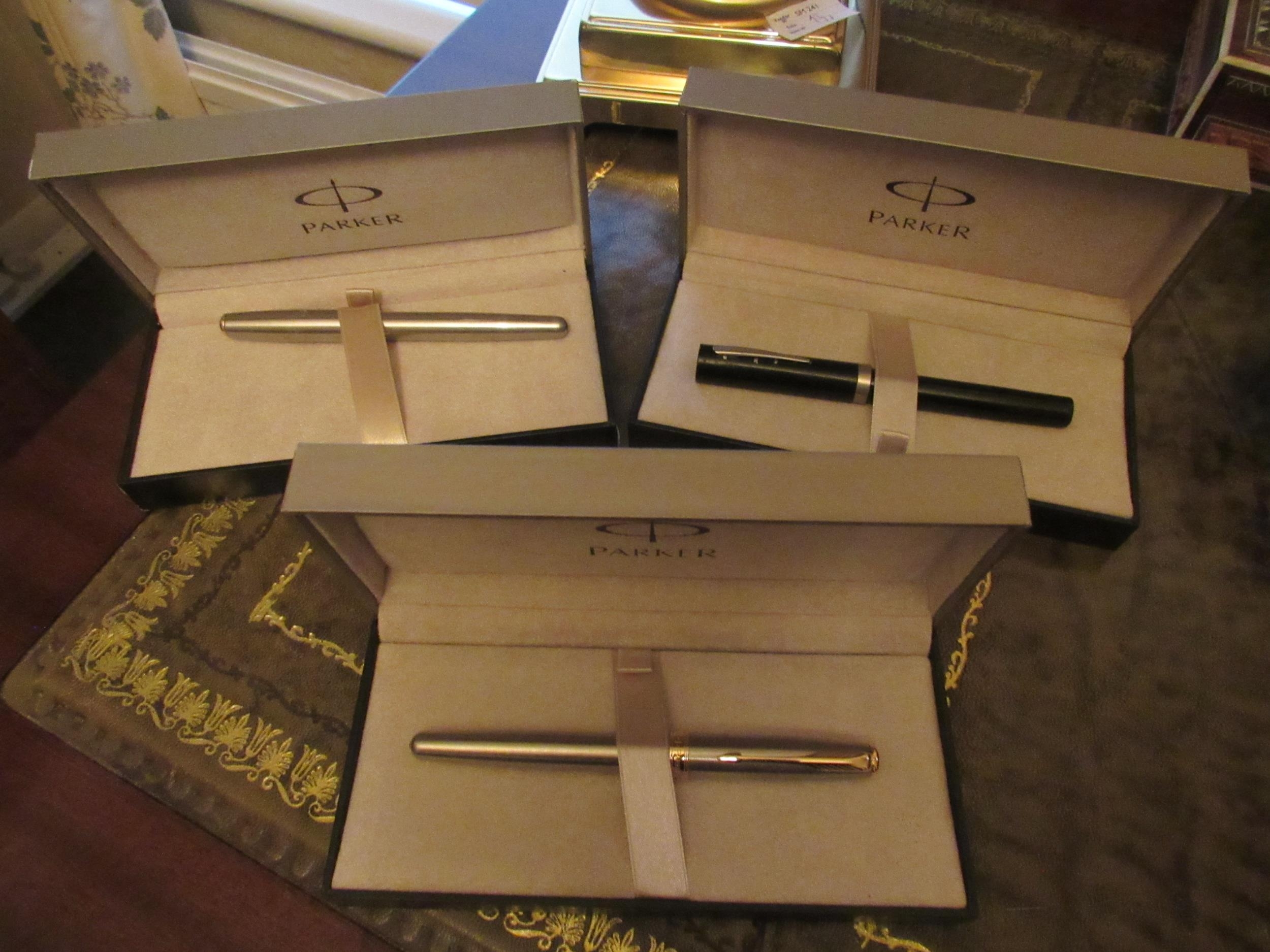 Two boxed Parker Sonnet pens and Parker box with Sheaffer pen (3)