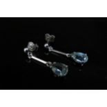 A pair of 18ct white gold pear shaped aquamarine drop earrings (2.13ct) 2.8cm drop, 2.7g, with