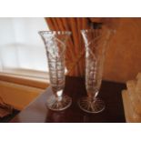 A fine quality crystal glass bowl, 20cm diameter and a pair of vases, 25.5cm (3)