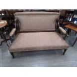 An Edwardian mahogany satinwood inlaid sofa with overstuffed striped silk upholstery