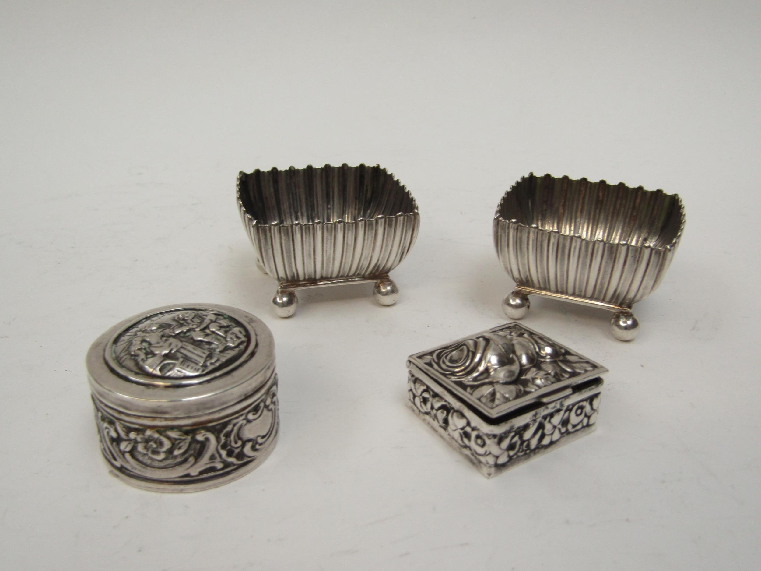 A pair of Goldsmiths & Silversmiths Co. (William Gibson & John Lawrence Langman) silver salts with