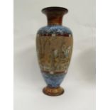 A Royal Doulton Hannah Barlow vase decorated in scraffito with stag hunting scene. Firing crack to