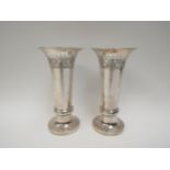 A pair of Liberty & Co. Arts & Crafts trumpet vases with hammered effect bodies, 19.5cm tall,