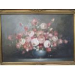 A 20th Century oil on canvas depicting floral display, signed, 60cm x 90cm