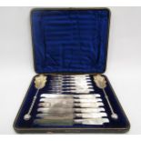 Two cased sets of fish knives and forks and cased set of mother-of-pearl forks, knives and serving
