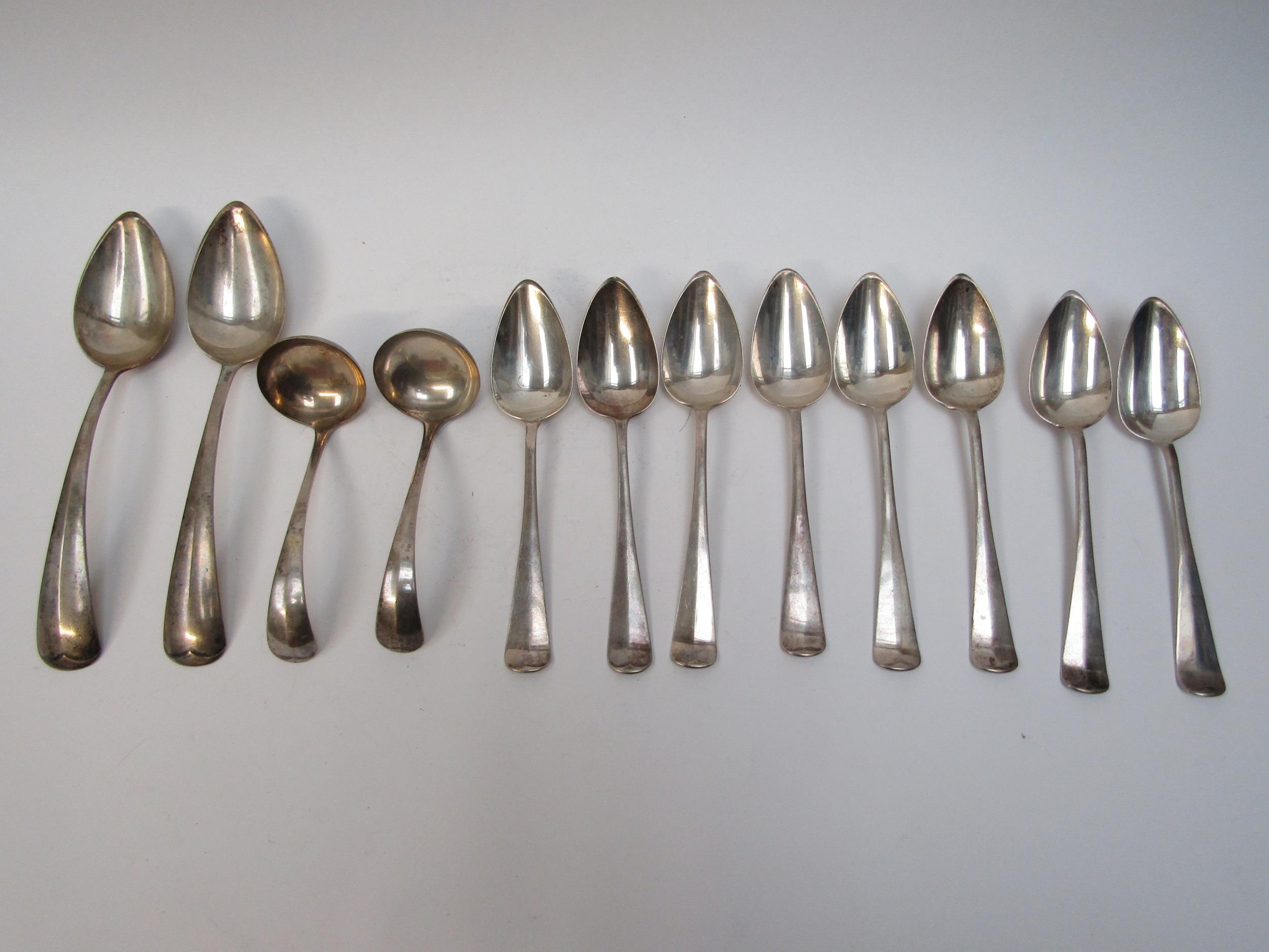Dutch silver flatware comprising eight spoons, two serving spoons and two ladles, dates for 1919 and