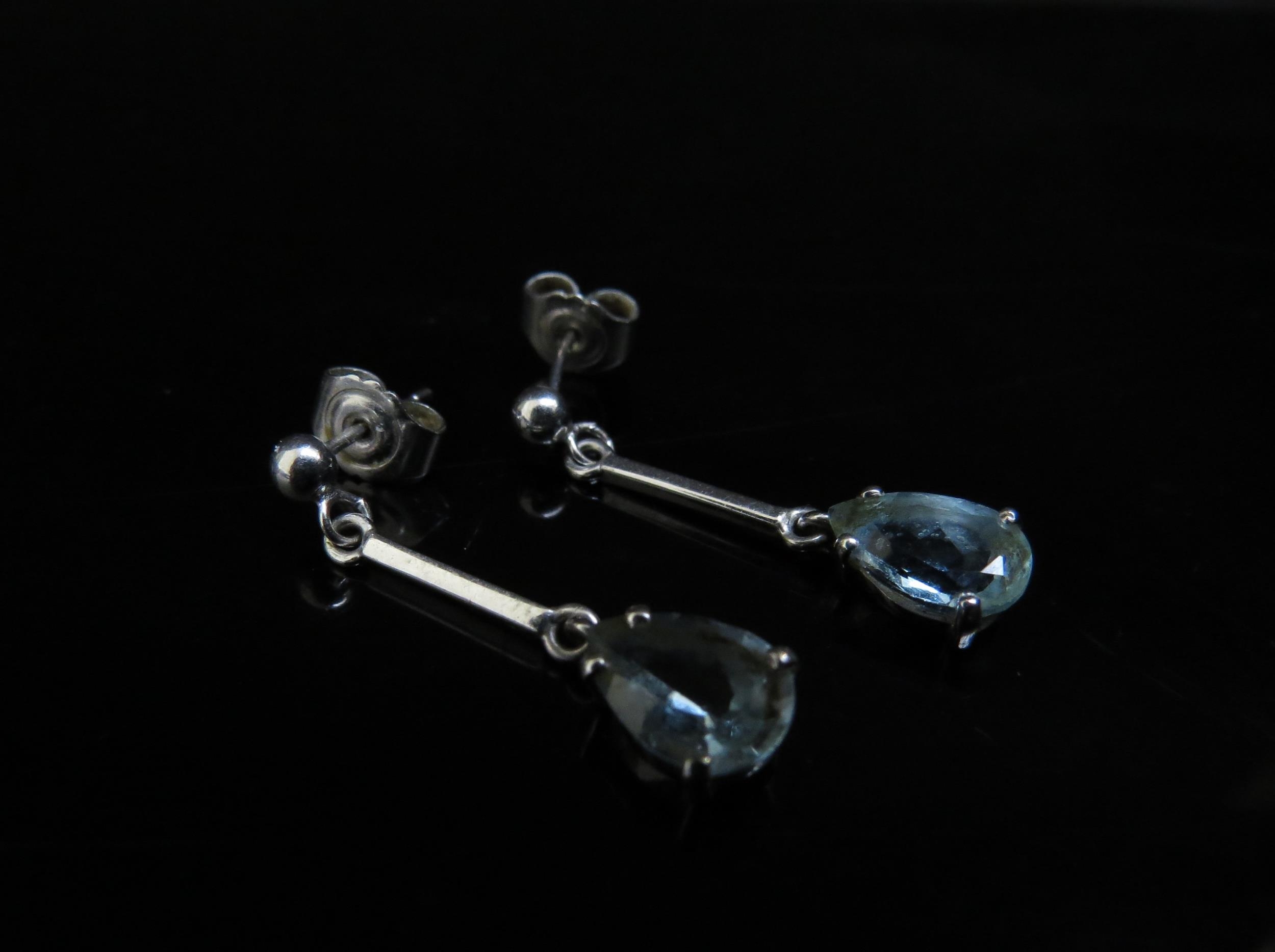 A pair of 18ct white gold pear shaped aquamarine drop earrings (2.13ct) 2.8cm drop, 2.7g, with - Image 2 of 2