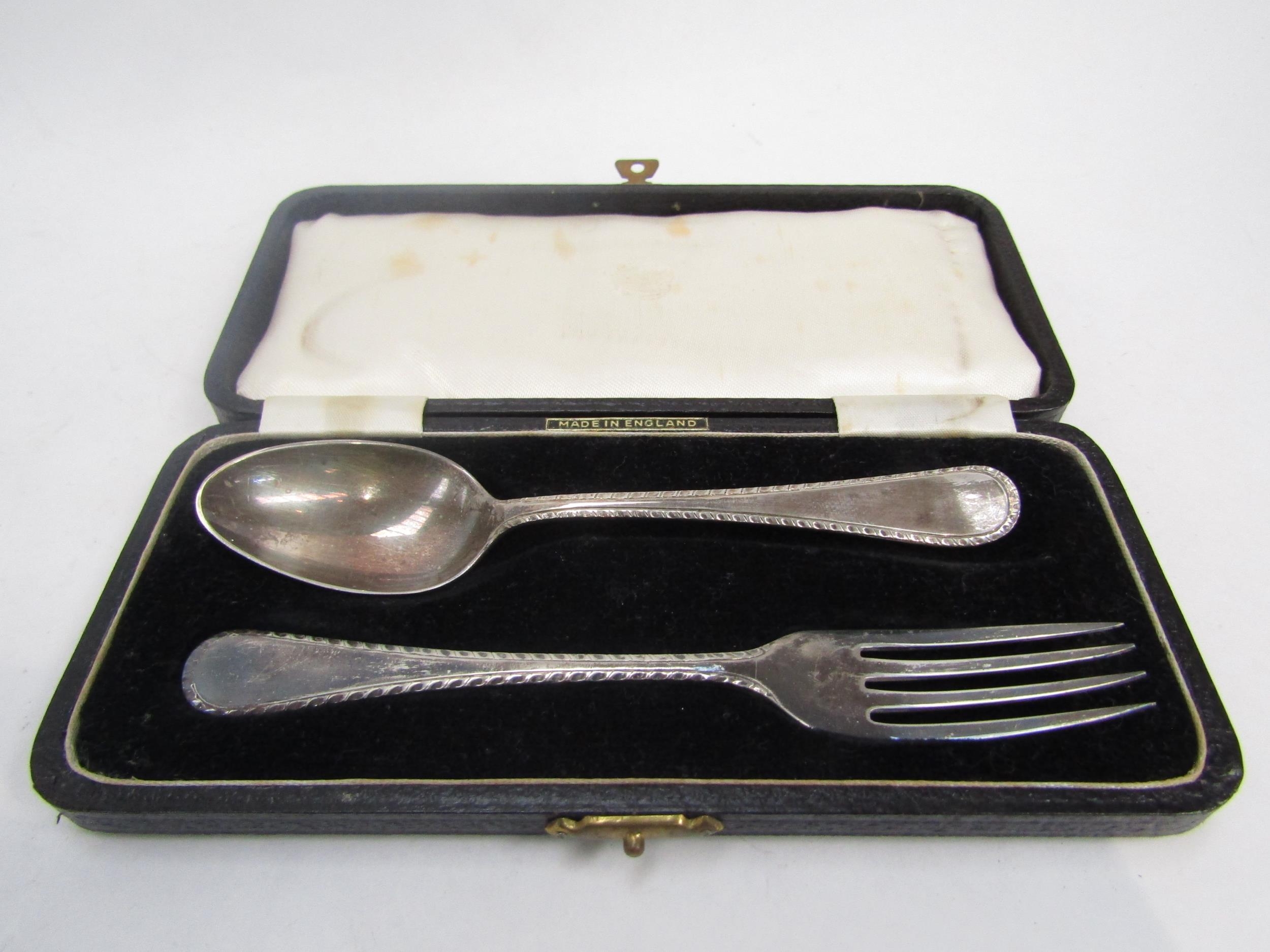 A silver two piece Christening set by Barker Brothers silver Ltd Birmingham 1951, 51g