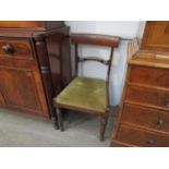 Two 19th Century mahogany dining chairs with melon fluted legs, green velour drop-in seats