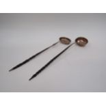 Two Georgian silver toddy ladles with twisted whale bone handles, 36cm and 37cm long