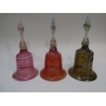 Three Nailsea glass wedding bells, 25, 26 and 27cm tall