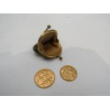 A 1907 gold sovereign and a 1902 gold half sovereign, in miniature suede coin purse