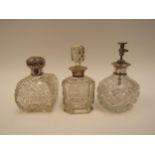 A silver topped atomiser and two scent bottles (3)