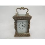 A Charles Frodsham limited edition 1977 silver miniature carriage clock, 8cm tall, with key