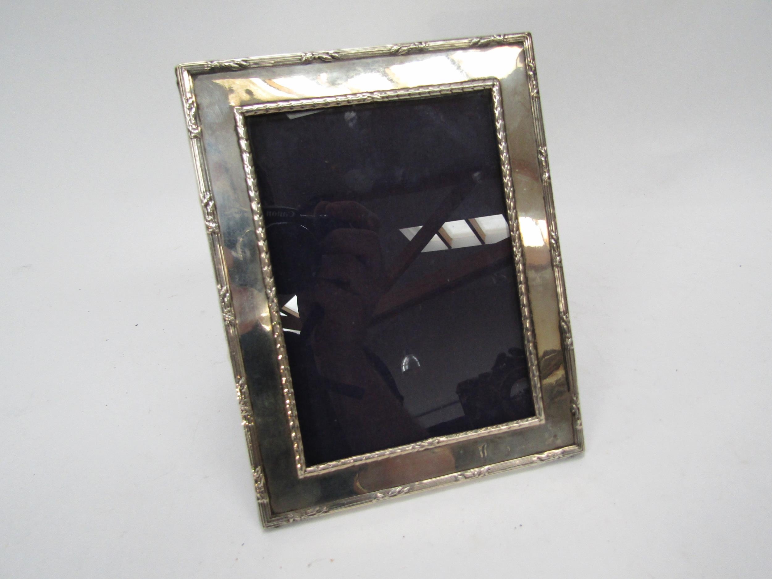 An E Mander & sons rectangular silver photograph frame, stamped Birmingham 1906, 17.5cm x 13.5cm