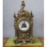 An ornate brass pierced case mantel clock with F. Marti Laine Paris cylinder movement , striking