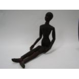 A 19th Century carved and stained pine artist's lay figure, articulated limbs, 49cm long