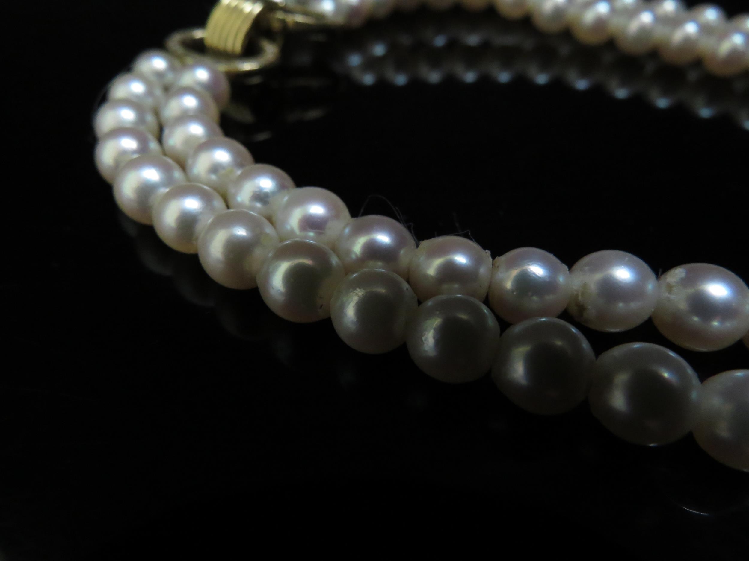 A double stranded pearl necklace 19cm long, diamond encrusted clasp, 42cm long - Image 3 of 3