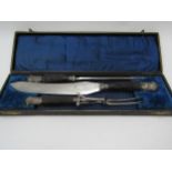 A cased silver and antler handled carving set by Sterlings and Co silversmiths, Sheffield
