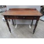A Victorian mahogany two drawer side table with 1/4 galleried back, 100cm long