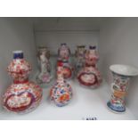 Eight miniature Oriental vases, including double gourd form and urn, tallest 16cm
