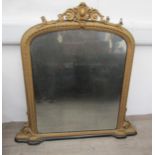 A highly ornate overmantel mirror elements missing, 113cm x 116cm
