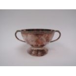 A Celtic design twin handled footed porringer, makers mark S.C. Sheffield 1993, 6.5cm tall, 10cm