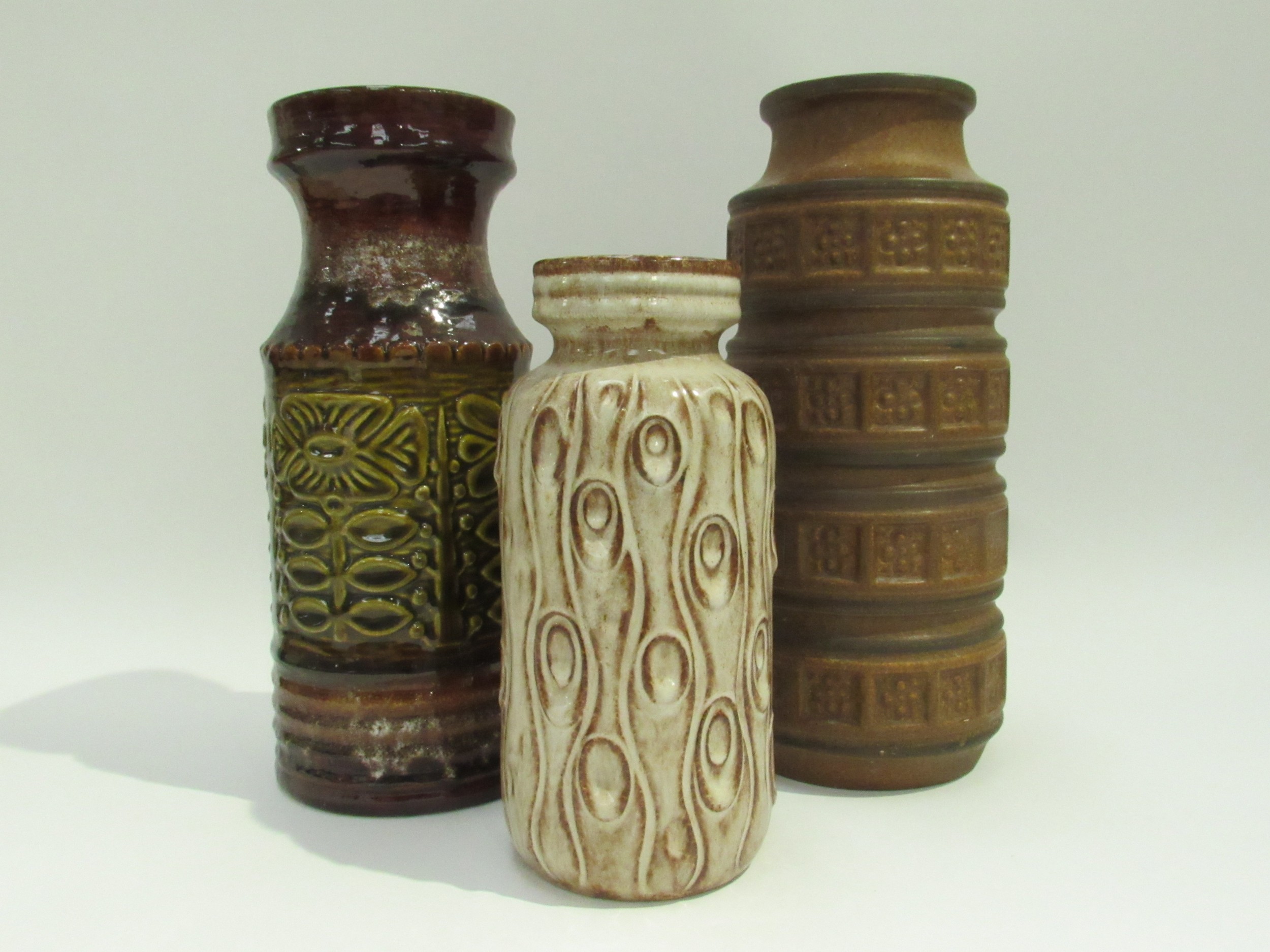 Three West German Pottery vases with treacle, cream and tan colour glazes. No.558/30, 288-22 and