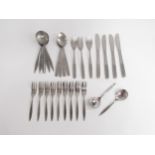 A collection of assorted Viners stainless steel cutlery including Mosaic pattern.