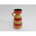 A Scheurich West German pottery jug with red and yellow banded decoration. 18.5cm high