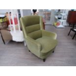 A 1940's Danish armchair in original green velour upholstery, dark stained short legs. 72cm x 86cm x