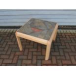 A Danish 'Gangso' coffee table in bleached beech with a stoneare tiled top. Label to underside. 69cm