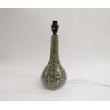 An Italian Pottery table lamp of bottle form and painted green line and grey dot pattern. Marks