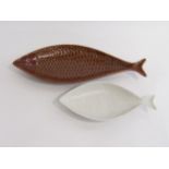 Two Fladen Fish dishes by Stig Lindberg for Gustavsberg, one in a treacle glaze, one white,