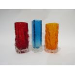 Two Whitefriars bark textured cylindrical vases in Ruby and Tangerine, 15cm high, plus a