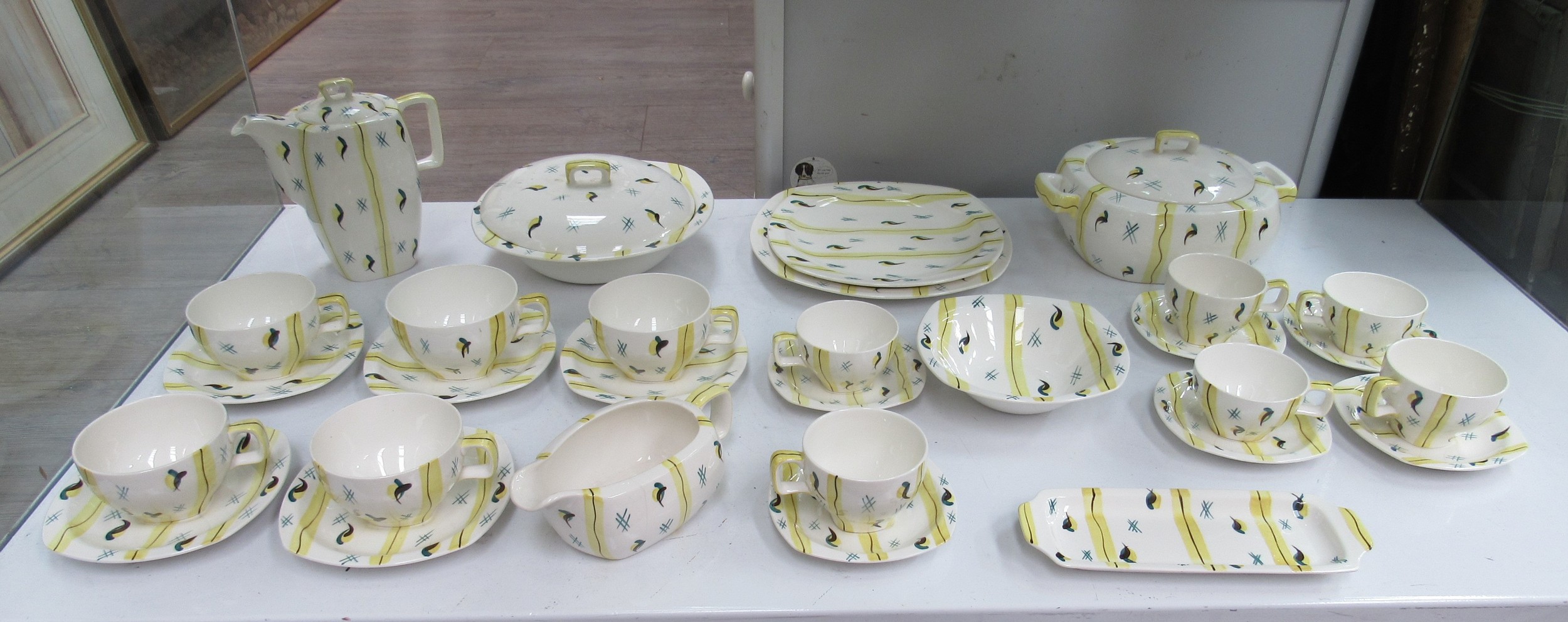 A collection of Midwinter "Fiesta" pattern dinnerwares designed by Jessie Tait to include coffee and