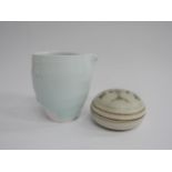 A studio porcelain jug with celadon drip glaze in the style of Jae Jun Lee, and a studio pottery