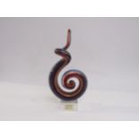 A Murano Glass sculpture of multi-coloured glass in scroll form on a clear plinth base. Labelled A.