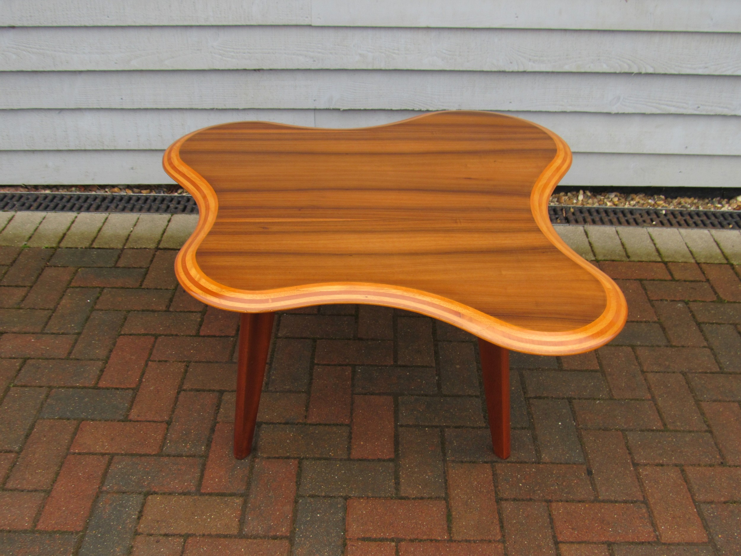Neil Morris for Morris of Glasgow - A 'Cloud' coffee table designed in 1947 with shaped laminated