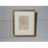 A framed and glazed print after Eric Gill, portrait "ElizG" & reverse monogram in the print).