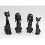 Four assorted vintage kitsch black pottery cats and dogs. Tallest 23cm