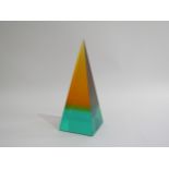 A Jonathan Adler Lucite obelisk in turquoise, green and orange colours. 26cm high