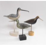 Three carved hand painted wooden bird sculptures in the style of Guy Taplin. Tallest 43cm
