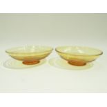 A pair of Whitefriars Powell slip trailed pedestal dishes in gold colourway. 19cm diameter