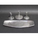 A set of three Viners pewter candle holders designed by Gerald Benny and matching tray, marked to