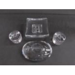 Three Orrefors signed clear glass candle holders and a Scandinavian clear glass pin dish in the