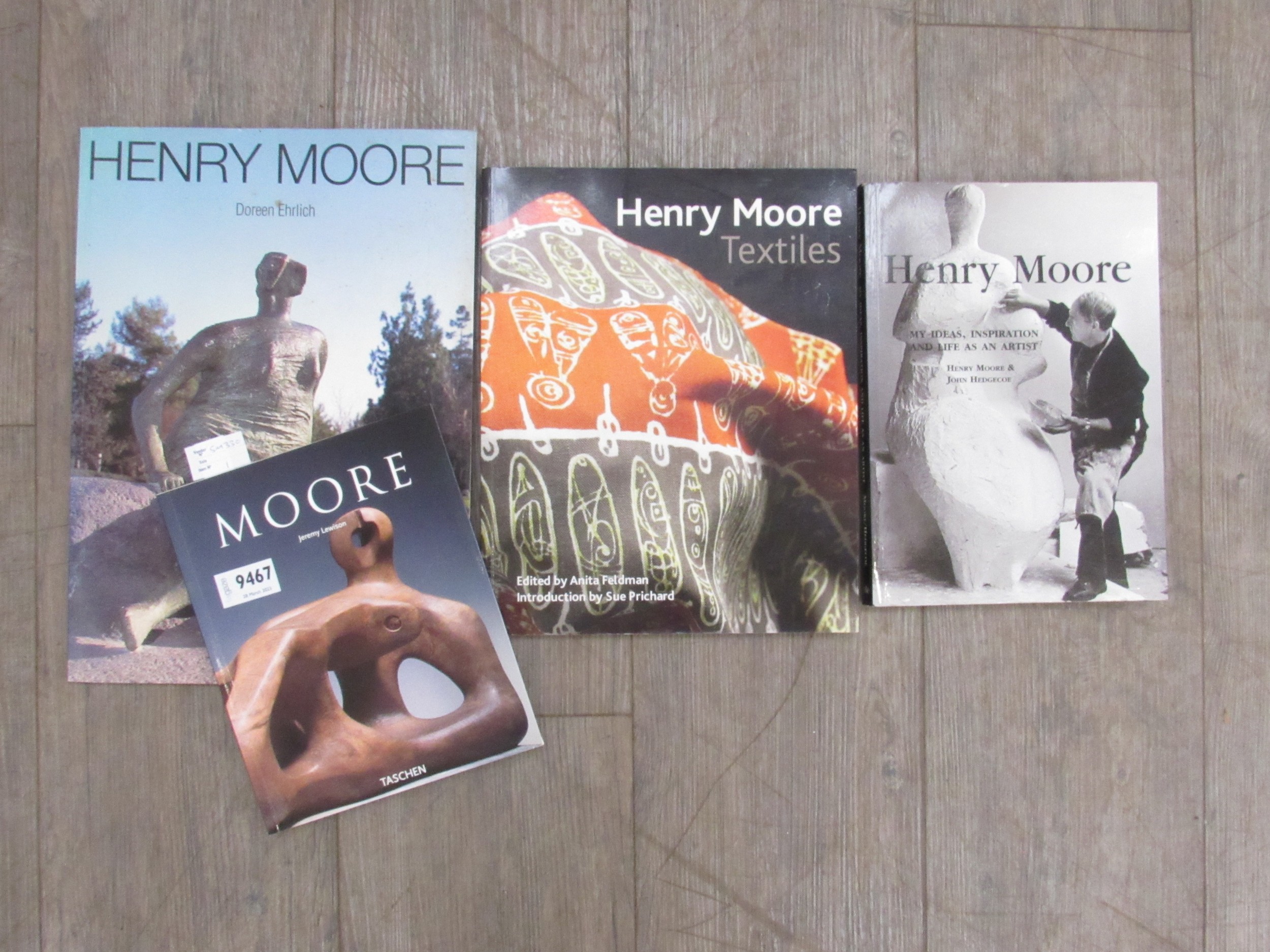 Four volumes relating to Henry Moore including Henry Moore textiles, Moore by Jeremy Lewison